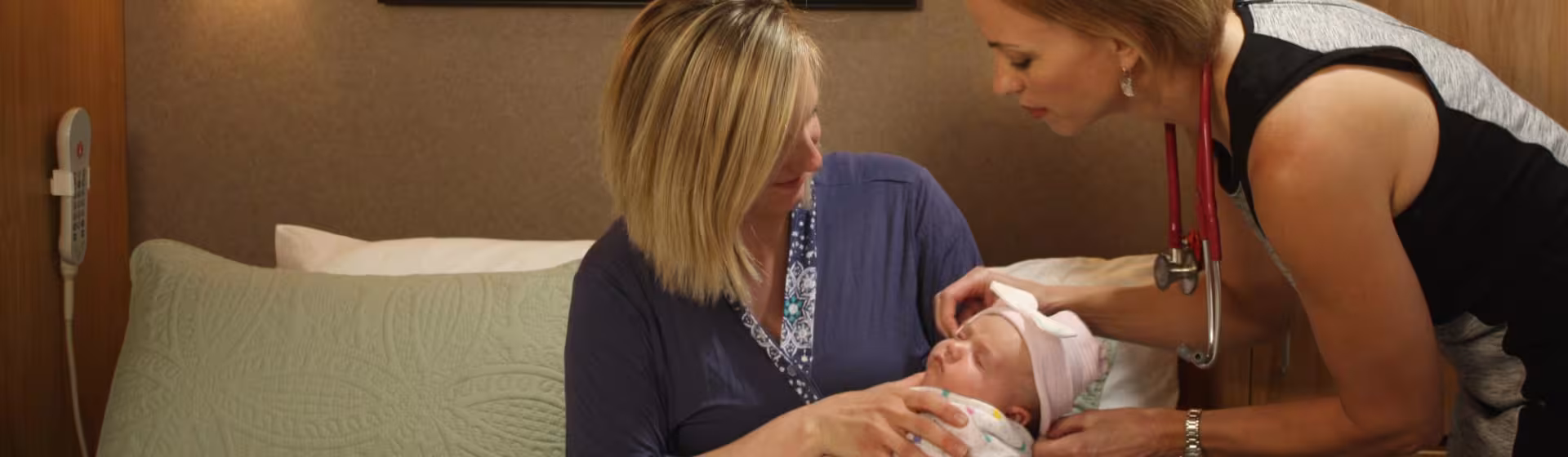 new mother with physician