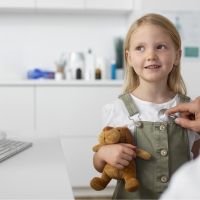 young girl at doctors office